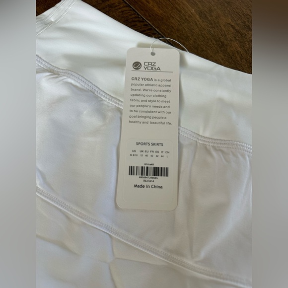 Set of 2 CRZ YOGA Womens High waisted Tennis Skirts 3 Pockets Skorts M - NWT - Picture 9 of 10